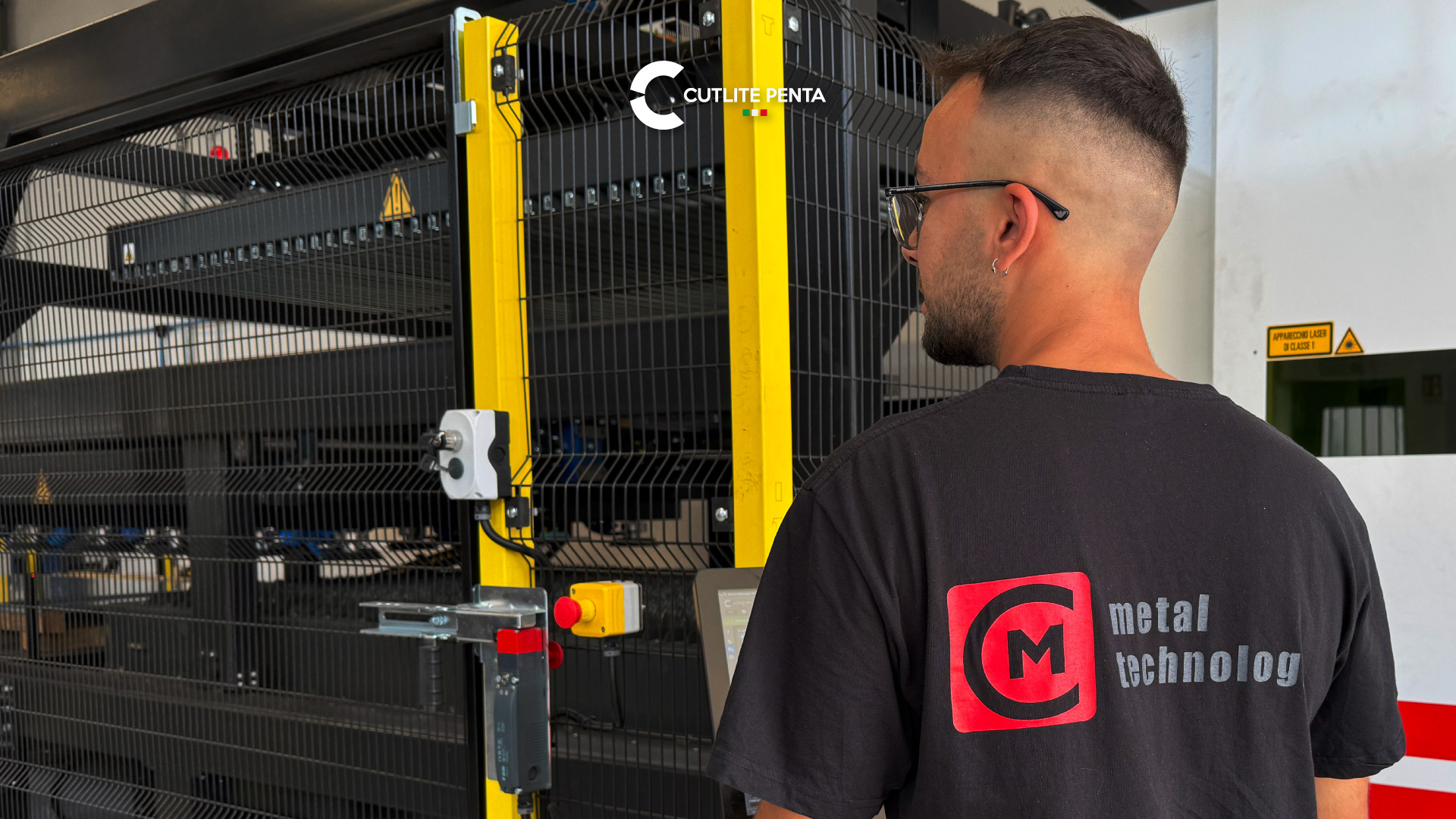 C.M. Gronde operator watching the automation storage behind the safety fence