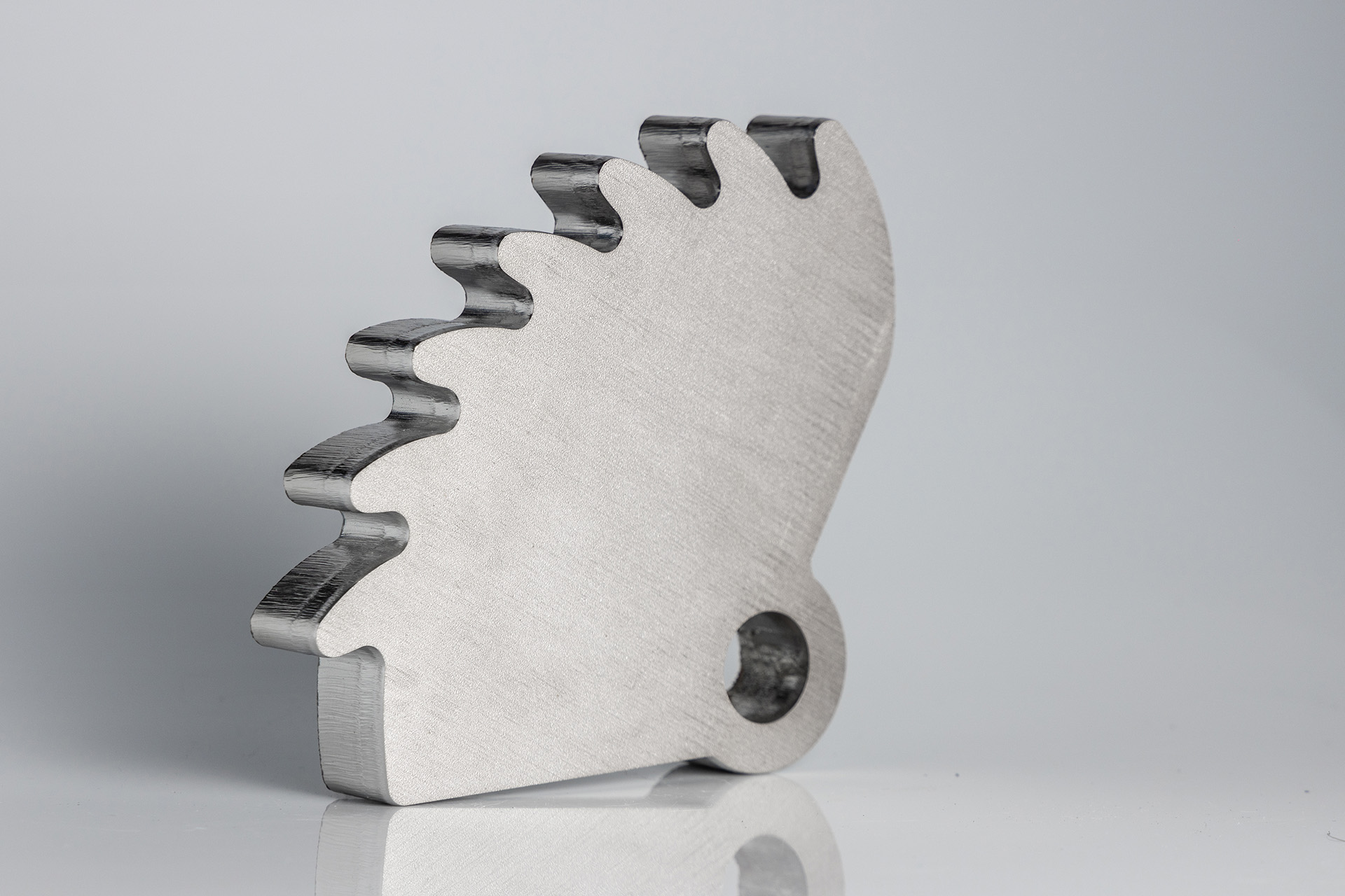 A steel sample cut with the fiber laser, with a clean linear cut.