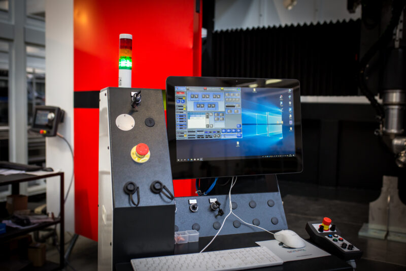 Cutlite Penta laser cutting head at work on an industrial metal component
